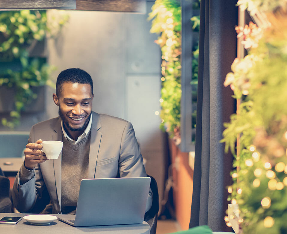 man working in coffee shop